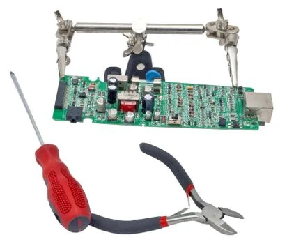 Circuit board with screwdriver Stock Photos