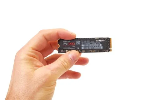 Circuit Board of an SSD held in hand Stock Photos