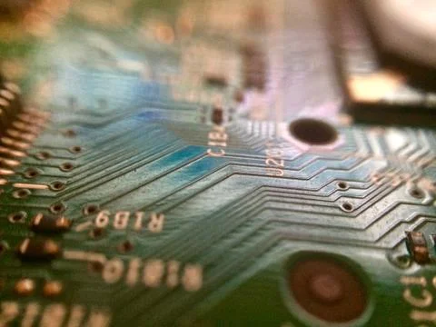 Circuit board with surface mounted devices selective focus at oblique angle Stock Photos