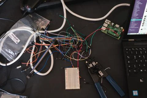 Circuit boards with cables and notebook Stock Photos