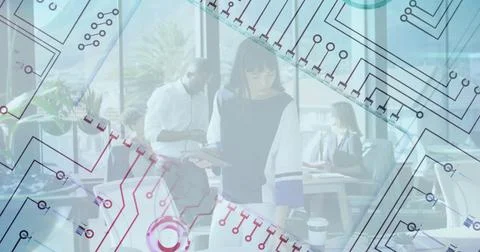 Circuit pattern image over diverse professionals working in modern office Stock Photos