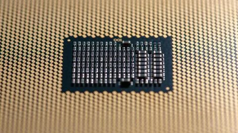 Circuitboard with processor on motherboard surface. Circuit board in macro close Stock Photos