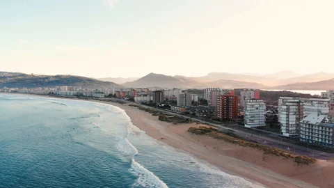 Circular aerial drone view coast skyline village next to the sea. 스톡 동영상 128515511