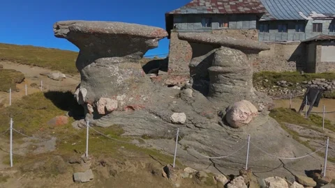Circular Aerial Orbit Around Iconic Babele Mushroom Rock Formations in Buce.. Stock-Footage 325773601