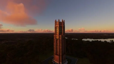 Circular aerial view at sunset of Bok Tower Gardens - Lake Wales in Florida Stock Footage 249456435