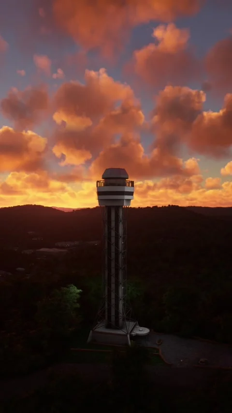 Circular aerial view at sunset of Hot Springs Mountain Tower in Arkansas Video stock 284884373