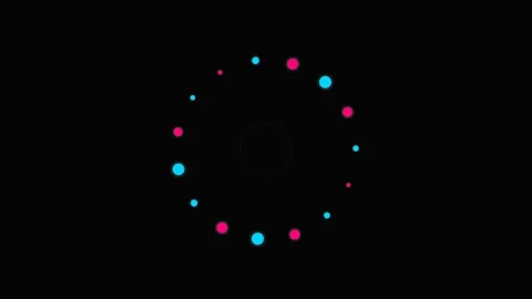 A circular arrangement of alternating pink and blue dots on a black backgroun Video stock 339614897