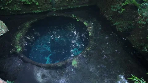 Circular blue spring pool of crystal clear water Stock Footage 341175568