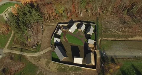 Circular Building Complex Around Garden Courtyard, Rural Setting, Drone Flight Видео 340361009