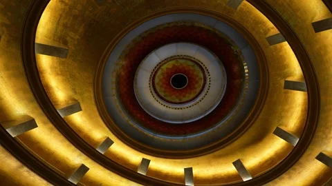 Circular ceiling design with concentric patterns and warm golden lighting 库存影片 328916837