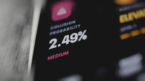 Circular collision probability gauge reads 2.49 percent Stock Footage 343379199