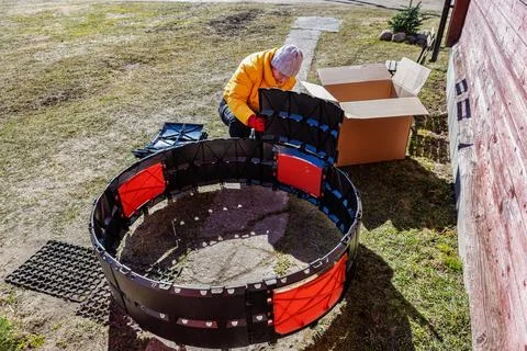 Circular compost bin structure expanding with additional molded panels duri.. Stock Photos