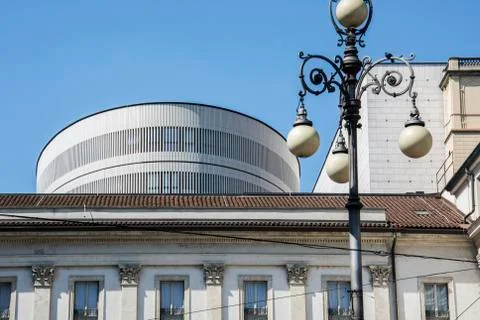 Circular construction seen from behind a building Stock Photos