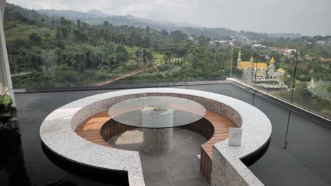 Circular Dining Restaurant Cafe Glass Wall with Bridge Mountains and Castle Stock Footage 280377019