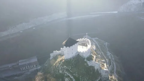 A circular drone flight around an ancient, miniature fortress Stock Footage 319253292