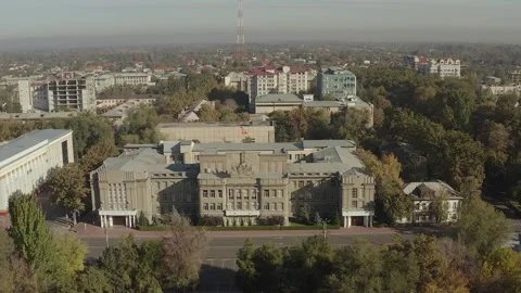 Circular drone flyby of the building of the Supreme Court of the Kyrgyzstan Stock Footage 259970106