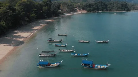 Circular drone. The focus is a lot of moored boats. Langkawi, Malaysia Stock Footage 106807414