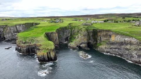 Circular drone shot of Whaligoe Steps. North Coast 500, Scotland Stock Footage 260607132