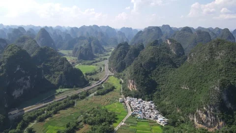 Circular Drone View Over Karst Peaks and Farmland Guangxi China Stock Footage 330281596