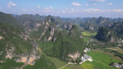 Circular Drone View Over Karst Peaks and Farmland Guangxi China Stock Footage 330281618