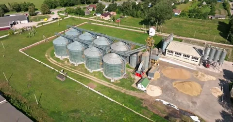 Circular flight and aerial view over agro silos granary elevator Stock Footage 249621576