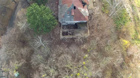 Circular flight over the destroyed house. Aerial Stockbeeldmateriaal 32707810