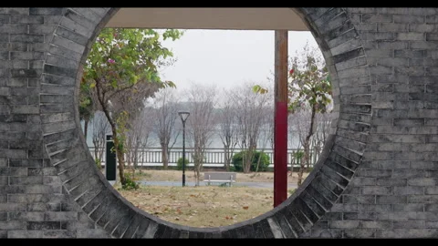 Circular Frame View of Park and Waterfront for Mindfulness Background Stock Footage 327654320