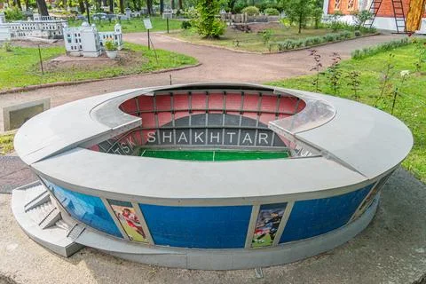 A circular, functional yet artistic structure with a central entrance, feat.. Stock Photos