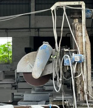 Circular granite cutting machine for thick slabs. Stock Photos