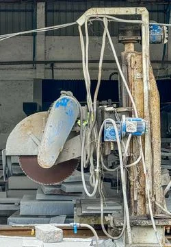 Circular granite cutting machine for thick slabs. Stock Photos