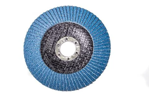 A circular grinding tool is shown from above, with a blue and black layered d Stock Photos