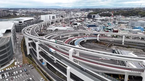 Circular Highway Junction | Kohoku Interchange | Japan - 4K Aerial Video Stock Footage 329056039