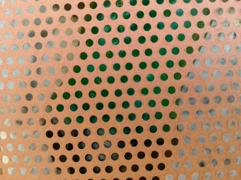Circular Hole Pattern and Industrial Mesh Surface Stock Photos