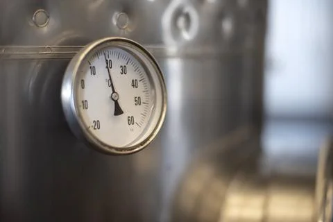 A circular industrial temperature meter, copy space Stock Photos