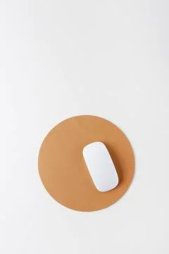 Circular leather mouse pad Stock Photos