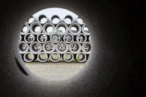 Circular look through concrete sewer pipe Stock Photos