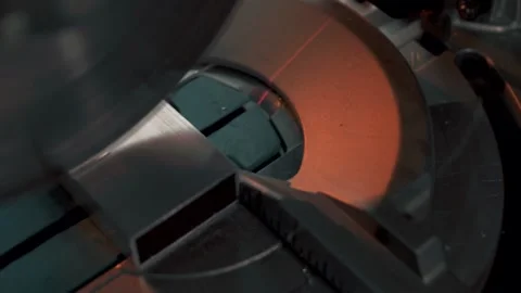 Circular machine cutting a metal structure in close-up. Slow Motion Stock Footage 179686635