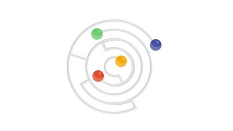 A circular maze with four distinct colored balls scattered throughout its d.. Stock Footage 332457874