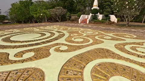Circular Mosaic Tiles at Buddhist Temple Courtyard in Laos Video stock 313184737