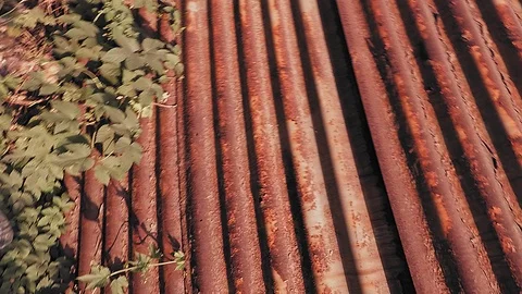 Circular motion camera background texture of old metal wavy sheets Stock Footage 113319351