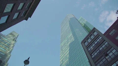 The circular motion of the camera on a tall building NYC Stock Footage 83875707
