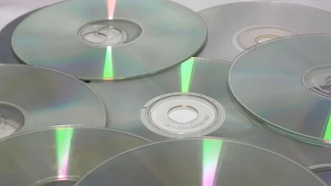 The circular motion of light and base on cds and dvds Stock Footage 111887882