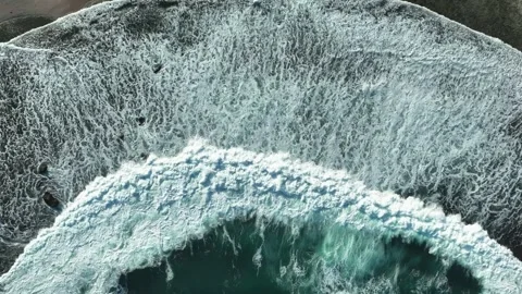 Circular Ocean Wave Pattern and Sea Foam Texture Stock Footage 340120730