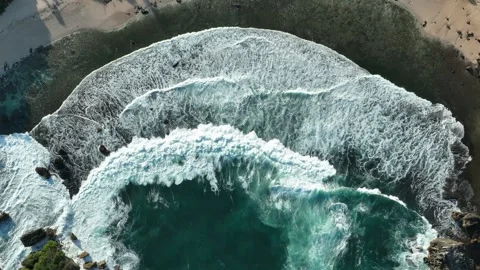 Circular Ocean Wave Pattern and Sea Foam Aerial View Stock Footage 340121806