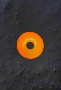 Circular Orange light with Grey background. Stock Photos