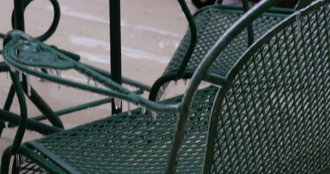 Circular outdoor table with icicles on the rim Stock Footage 153527267