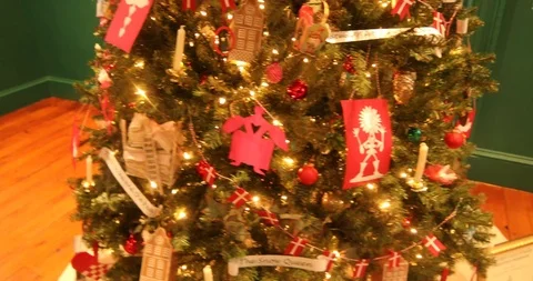Circular Pan of a Christmas Tree with Hand-made Paper Ornaments Stock Footage 121541710