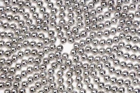 Circular pattern of string of silver beads Stock Photos