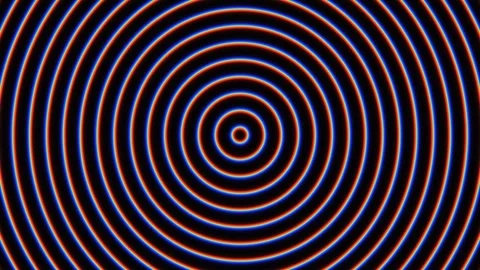 Circular patterns create concentric designs on a dark Stock Footage 338012310