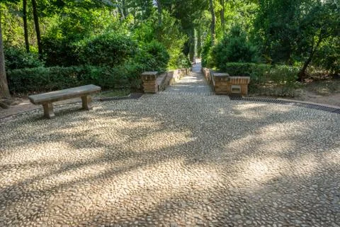 Circular patterns on a stone walking path at the Alhambra palace in Granada,  Stock Photos
